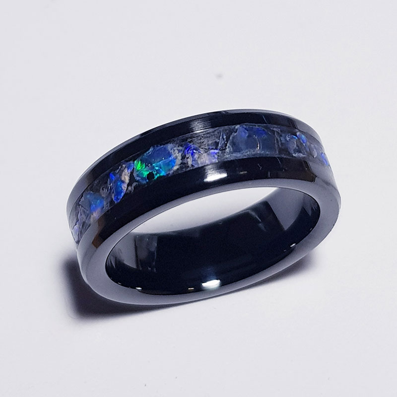 Black ceramic ring with black opal made by Rocks and Crystals AU.
