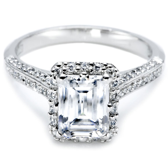 Put a ring on in with this beautiful Emerald cut engagement ring