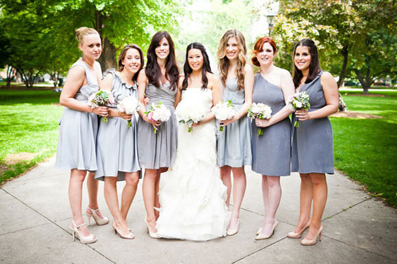 Bridesmaids wear grey mismatched wedding day attire