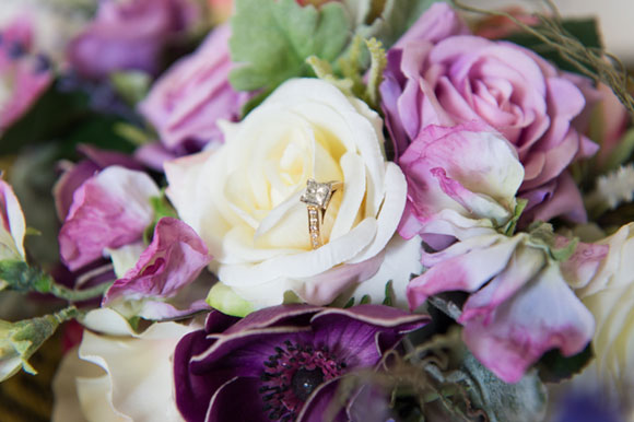 Purple wedding bouquets and wedding rings