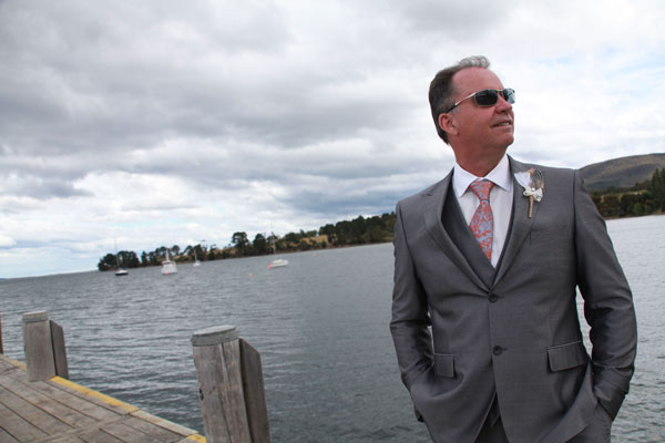 Dashing Groom by the Waters Edge in Tasmania