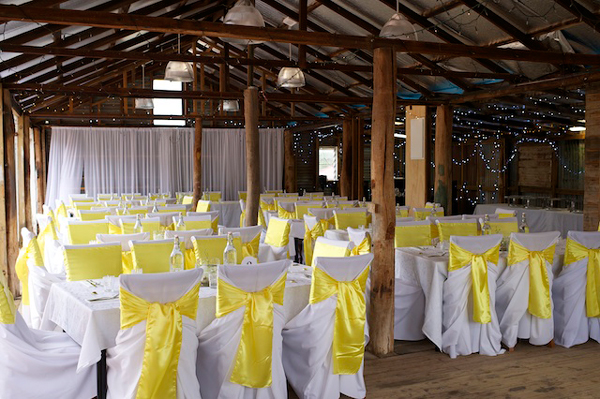 Yellow rustic wedding ceremony setup