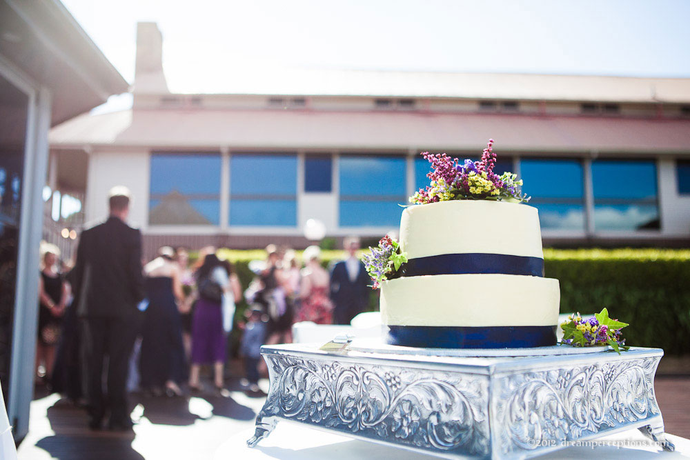 Purple wedding cakes with fresh flowers