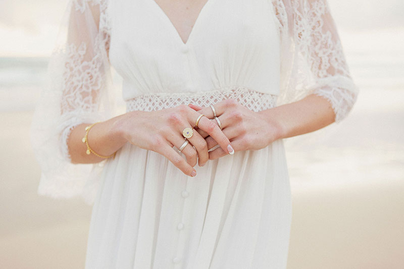 Beautiful variety of rings worn by bride.
