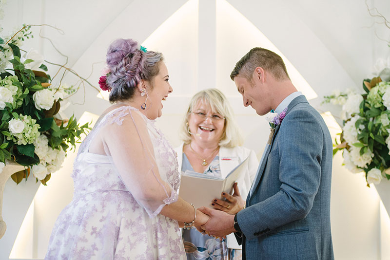Annette Richards Celebrant laughing with happy Bride and Groom at their wedding ceremony.