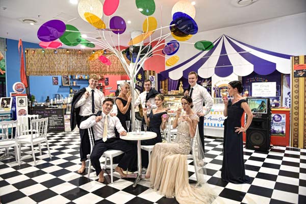 Wedding party in checkered dining room theme venue