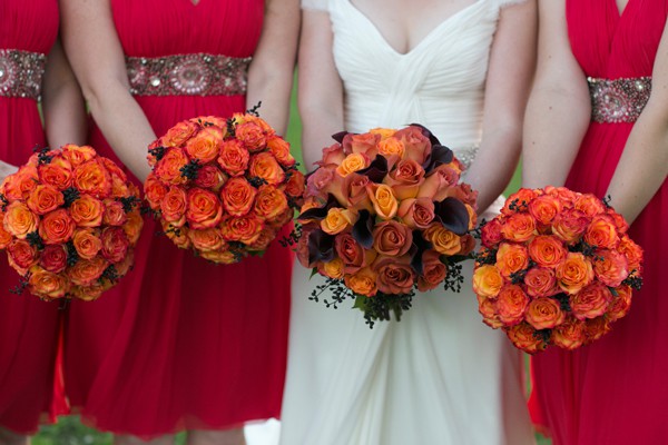 Bridesmaids holding roses