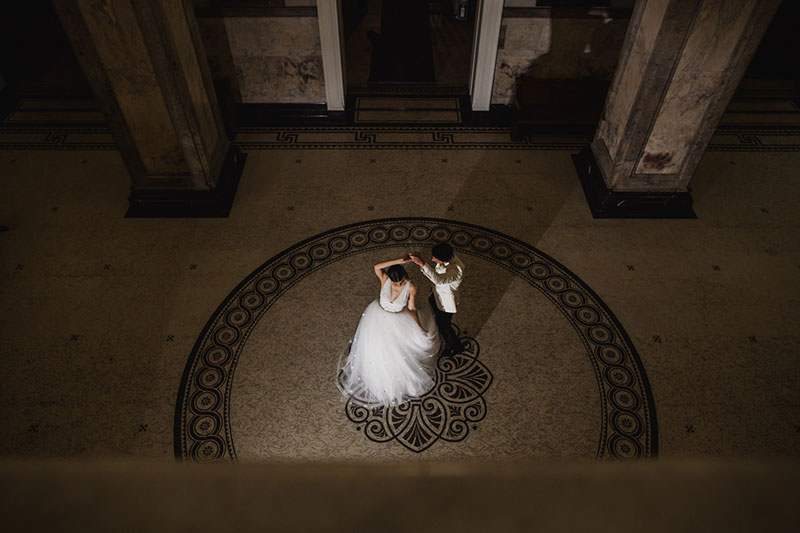 Looking down from an elevated position to Bride and Groom on dancefloor.