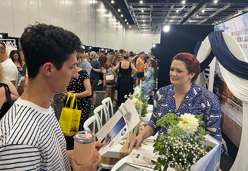 Attendees meeting wedding professionals at Your Local Wedding Guide Brisbane Expo.