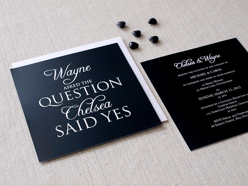 White on black engagement invitations.