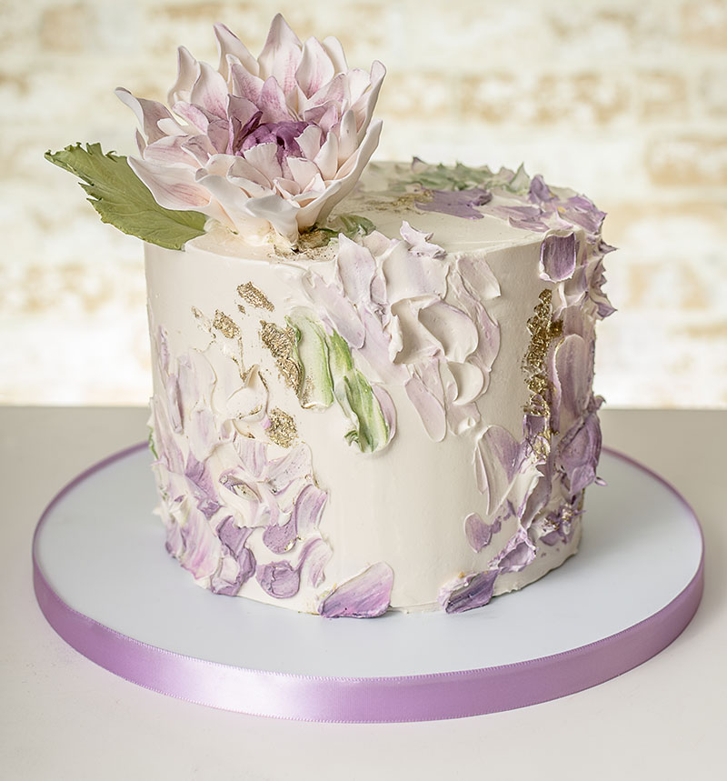 Hand painted 3D butter cream flowers on cake.