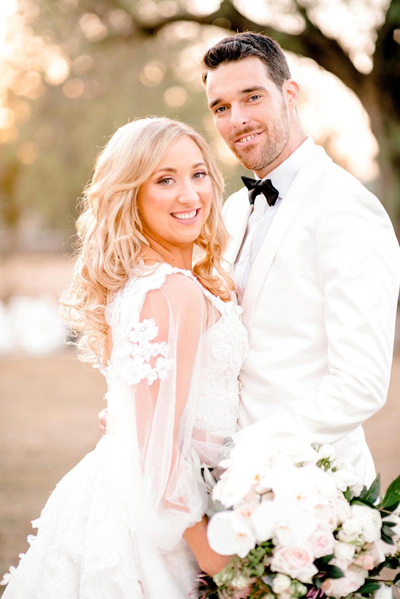 Bride and Groom smiling together.