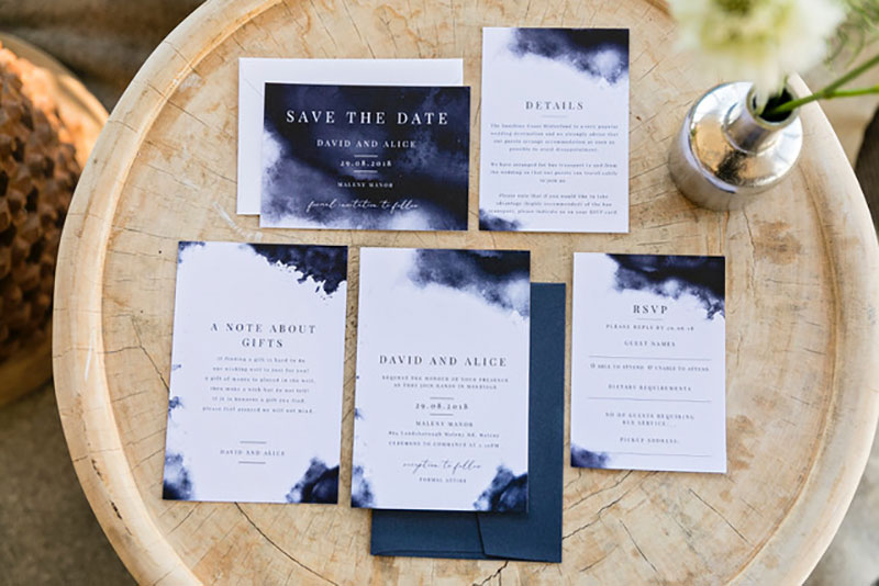 Wedding invitation suite from Blue Bird Invitations.