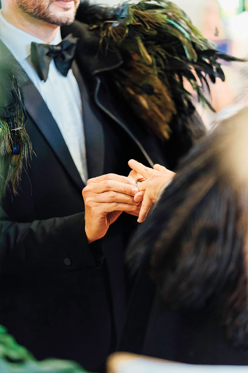 Brad and Scott exchanging rings at Broadway Chapel