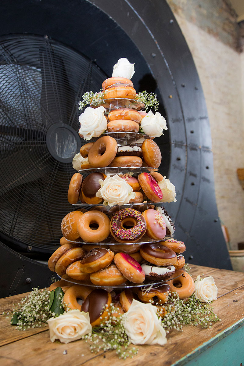 Wedding Cake made of Donuts stacked high.