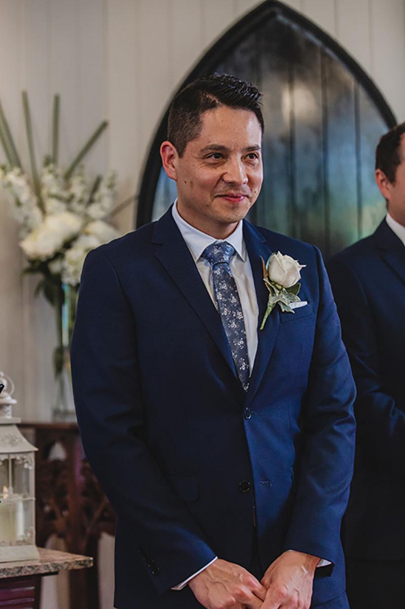 Jonathan waiting at the alter at Broadway Chapel for his bride-to-be.