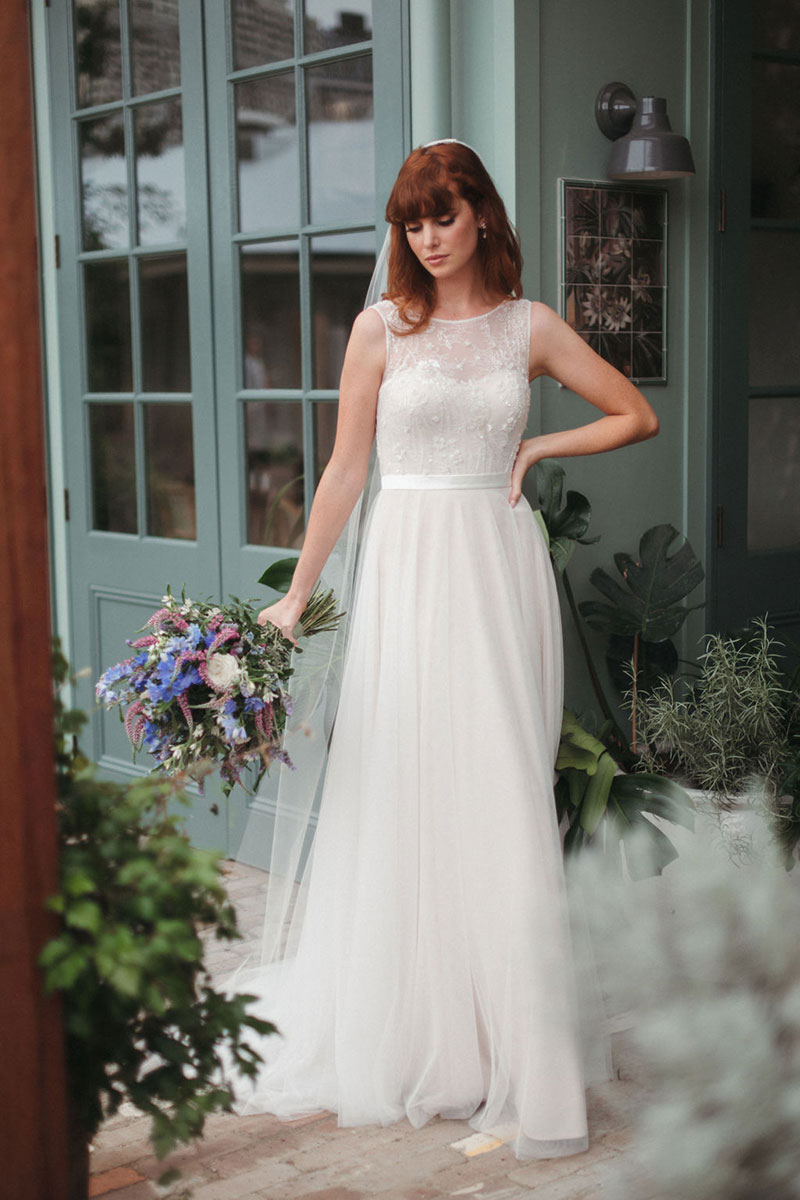 Red haired bride wearing Fleur gown from French by Wendy Makin