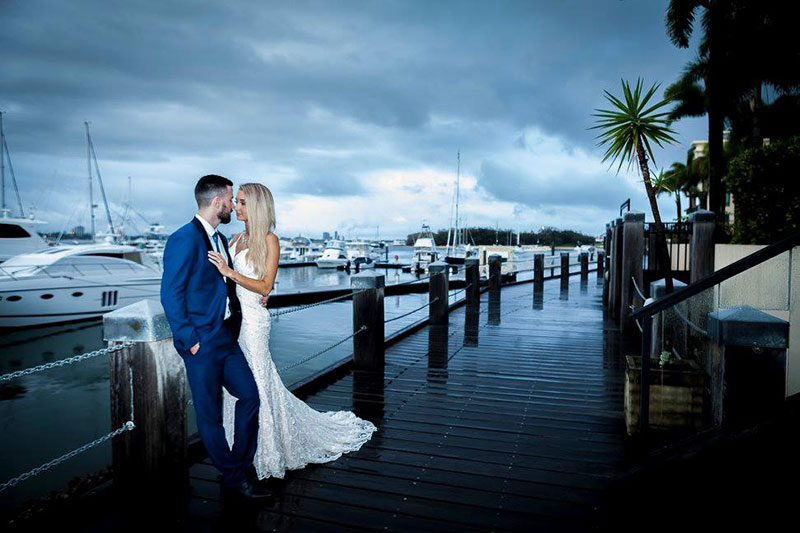 Bride and Groom enjoying the Marina views at Glass Dining & Lounge Bar