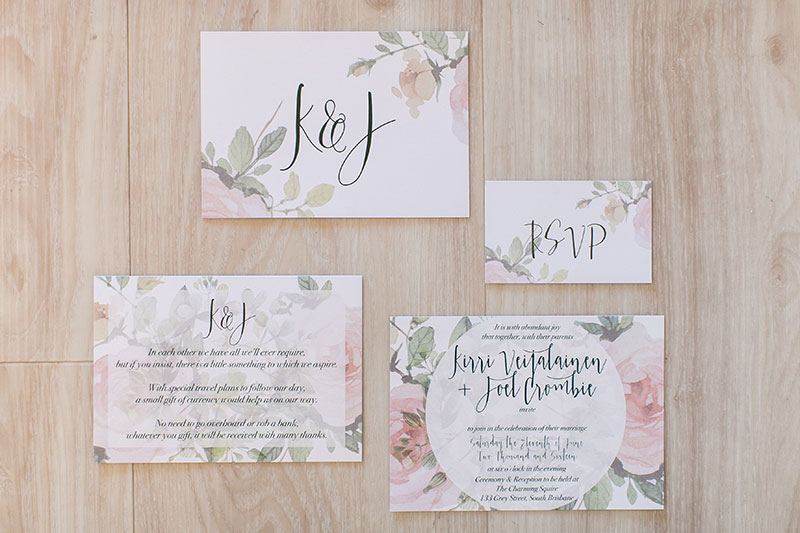 Beautiful wedding invitations on a floral background.