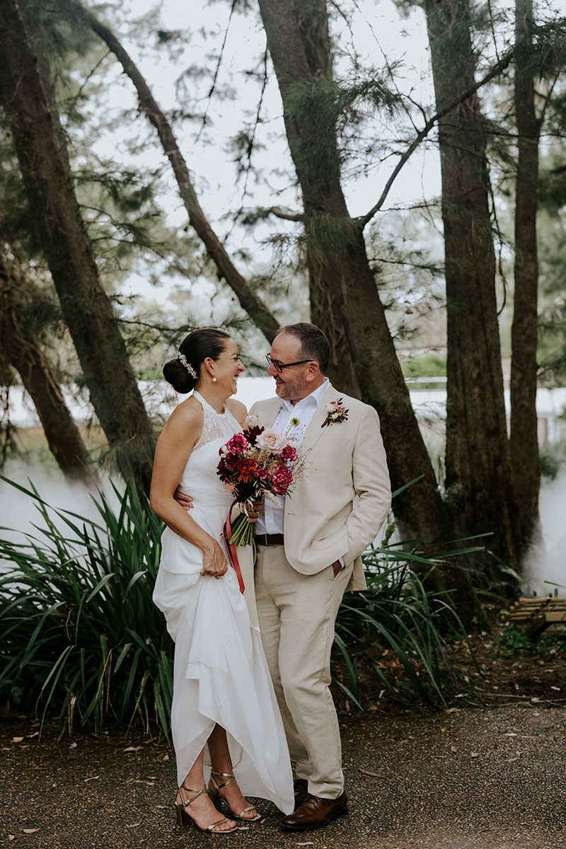 Mayumi + Sam with Lake Burley Griffin in the background.