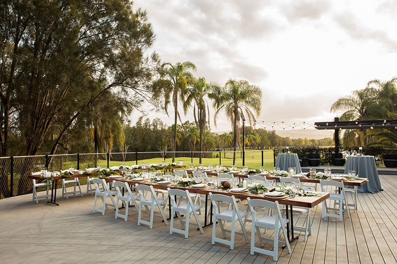 Outdoor wedding reception area set up at Mercure Gold Coast Resort.