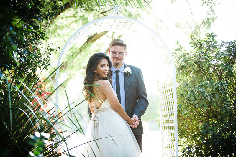 Bride and Groom in the landscaped gardens of Robertson Gardens.