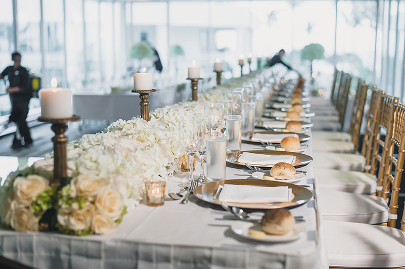 Luxurious wedding table set with flowers and candles at Sheraton Grand Mirage Resort, Gold Coast.