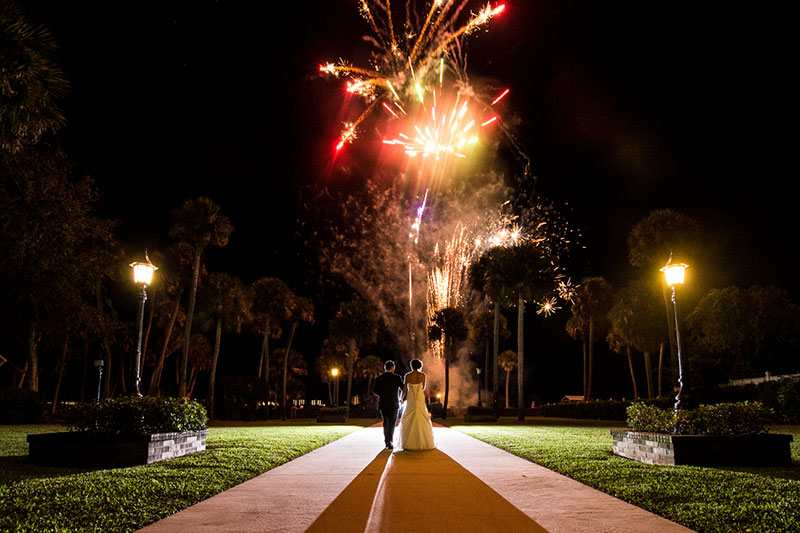 Bride and Groom under fireworks.