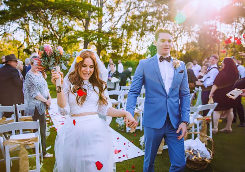 Bride and Groom newly married in a garden ceremony at Surfers Paradise Golf Club.