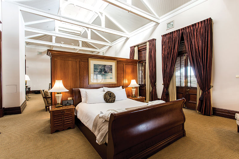 Large Hotel Suite with high ceilings at Treasury Brisbane.