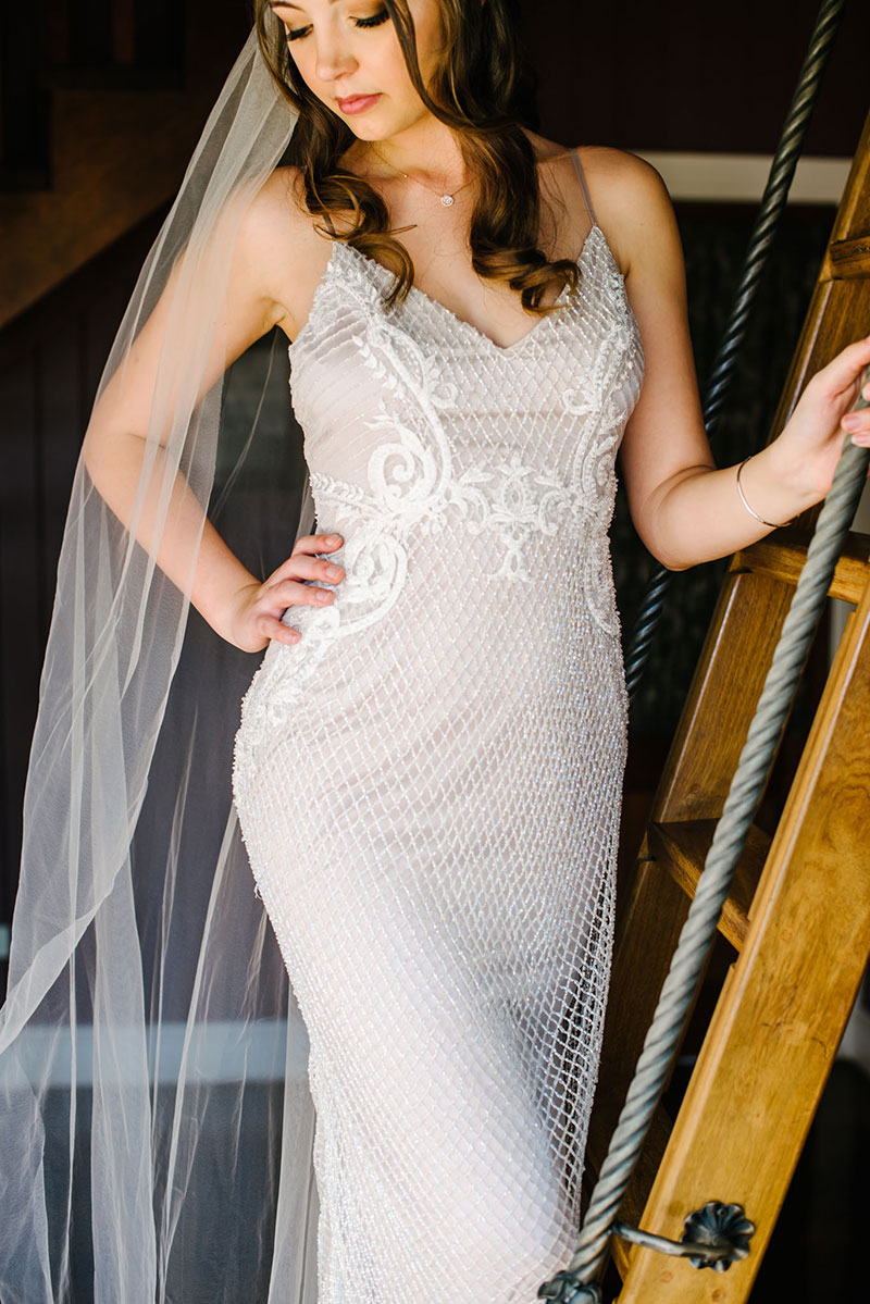 Close up of bride's lace wedding gown.