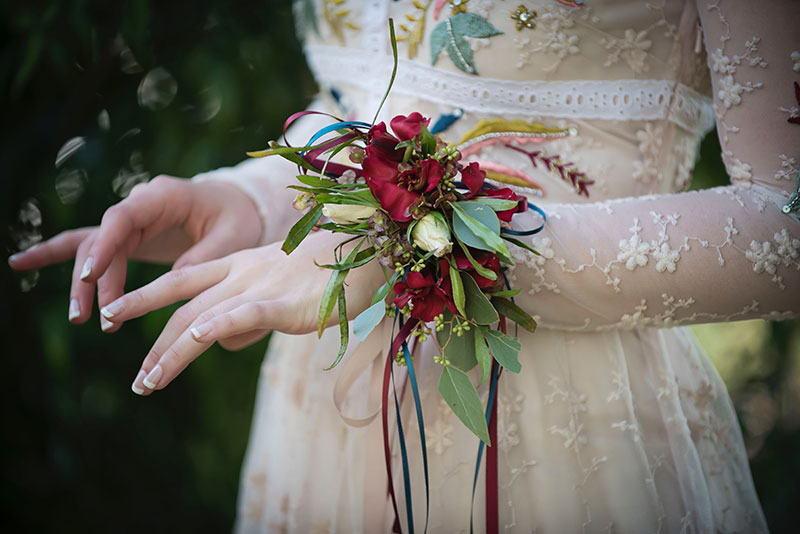 Delicate wrist corsage.