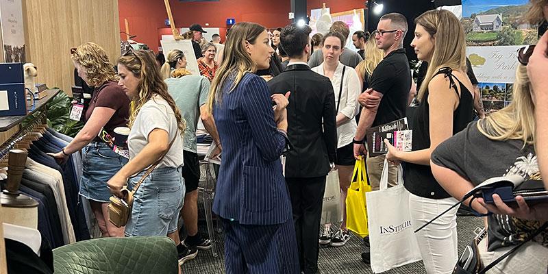 Attendees chatting to exhibitors at Your Local Wedding Guide Sydney Expo.