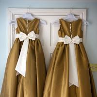 Dresses hanging on a door