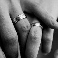wedding rings on fingers