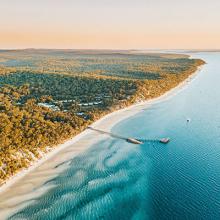Beautiful photo of the ocean and western bay sunset at Kingfisher Bay Resort.