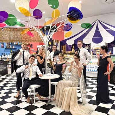 Wedding party in checkered dining room theme venue