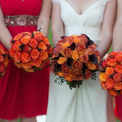 Bridesmaids holding roses