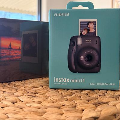 Fujifilm Insta Mini 11 camera with an album giveaway.